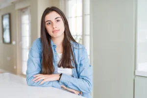 A young woman at home during outpatient opioid rehab.